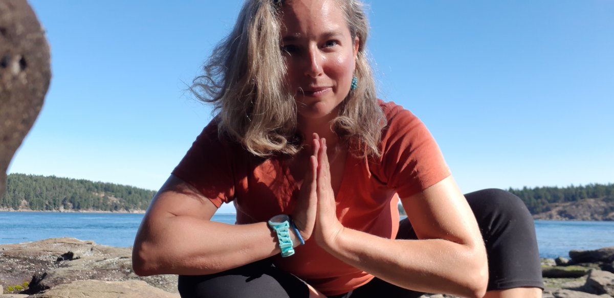 Marni Levitt meditating outdoors, radiating focus and inner inspiration.
